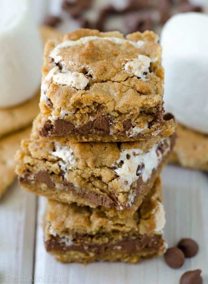 S'mores Chewy Cookie Bars: Soft and chewy graham cookie bars filled with a fluffy layer of marshmallow creme and milk chocolate chips. All the s'more without the flame!