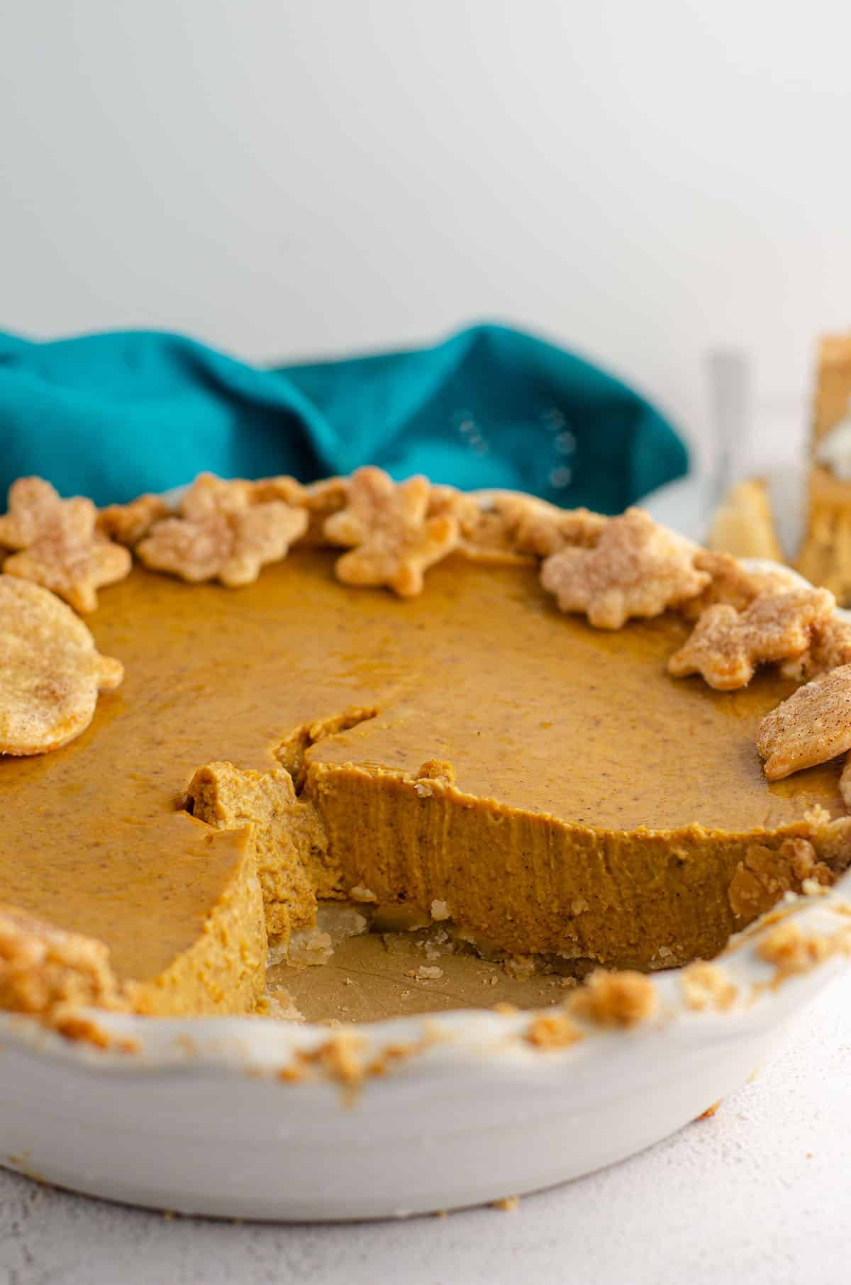 pumpkin pie with some slices removed