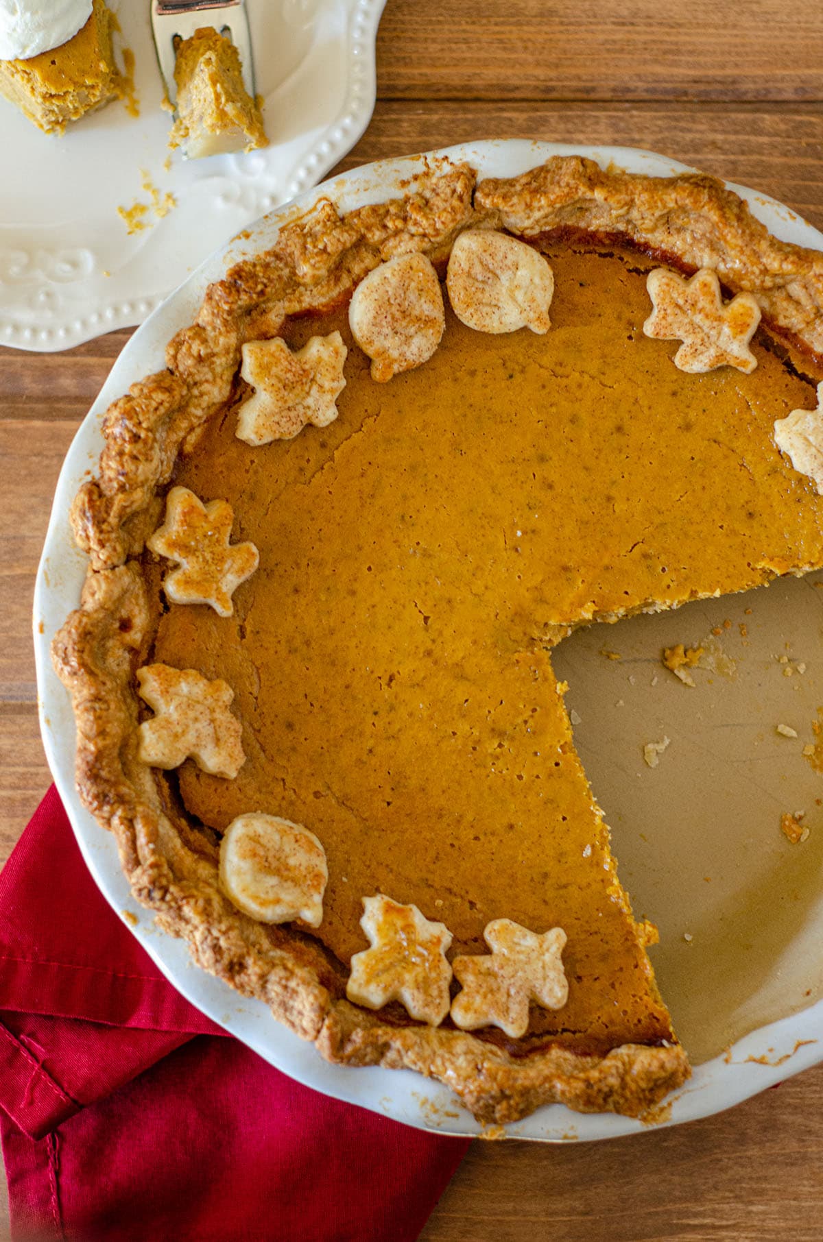 aerial photo of pumpkin pie with some slices removed