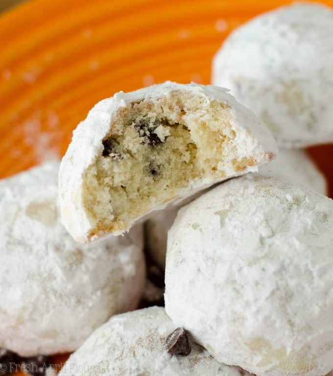 Chocolate Chip Snowballs: Buttery, melt-in-your-mouth shortbread cookies filled with mini-chocolate chips and rolled in powdered sugar.