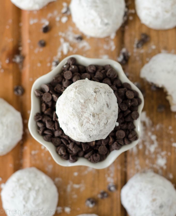 Chocolate Chip Snowballs: Buttery, melt-in-your-mouth shortbread cookies filled with mini-chocolate chips and rolled in powdered sugar.