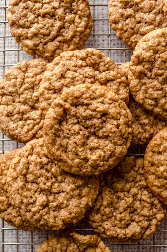 Aerial photo of oatmeal cookies on a cooling rack.