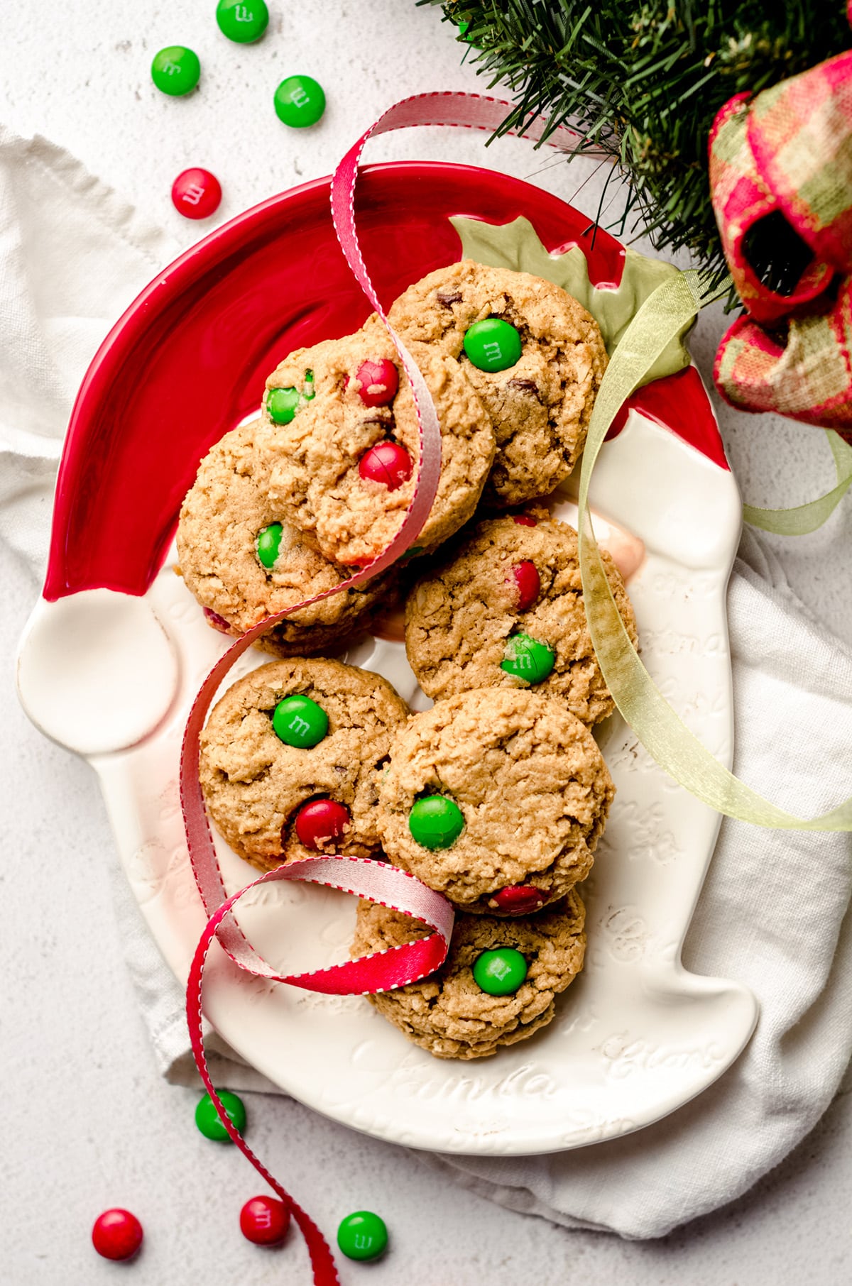 christmas monster cookies on a santa plate