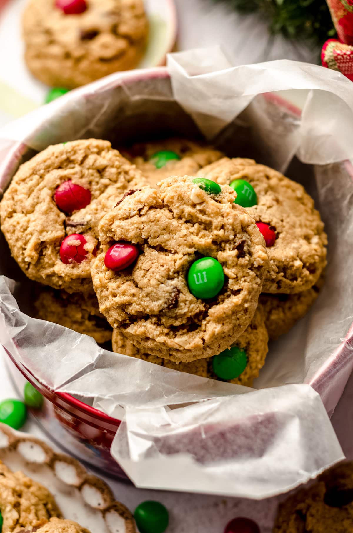 christmas monster cookies in a cookie tin