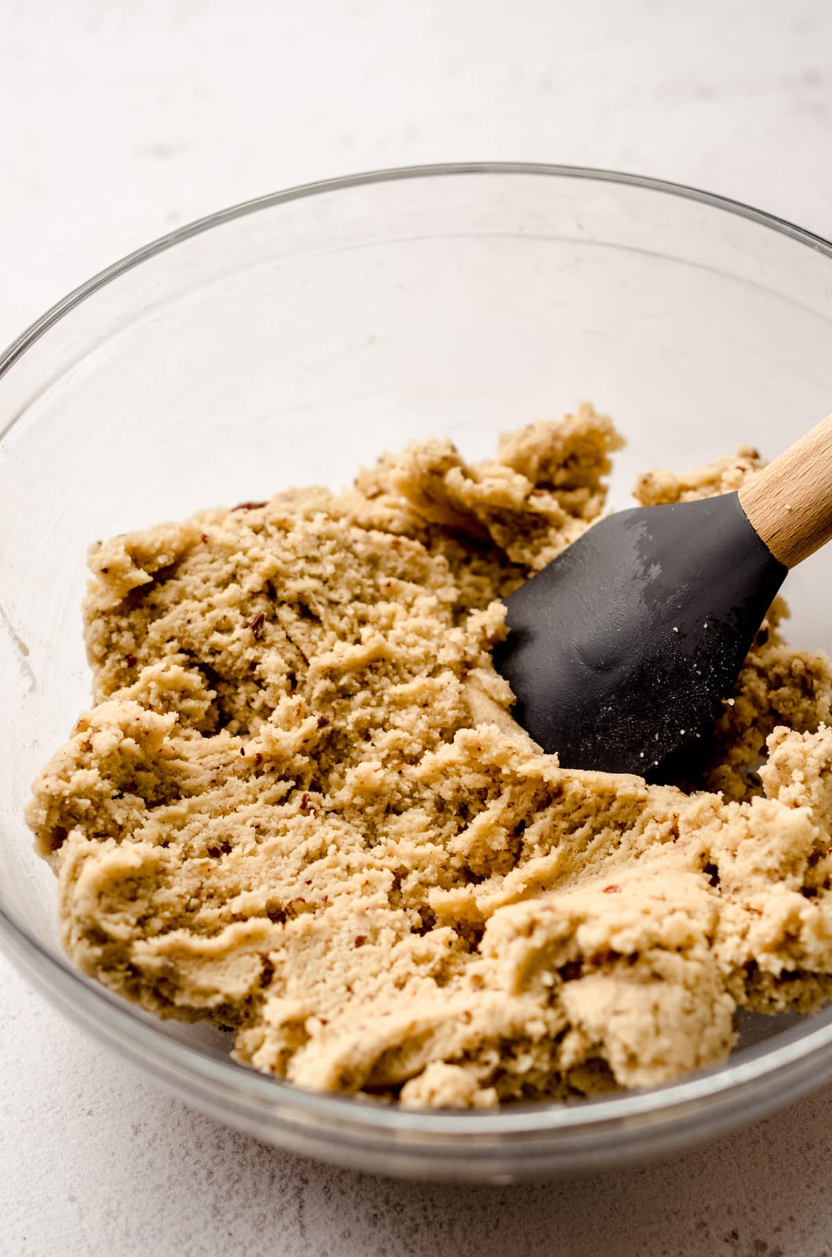 almond flour pecan sandies cookie dough batter in a glass bowl