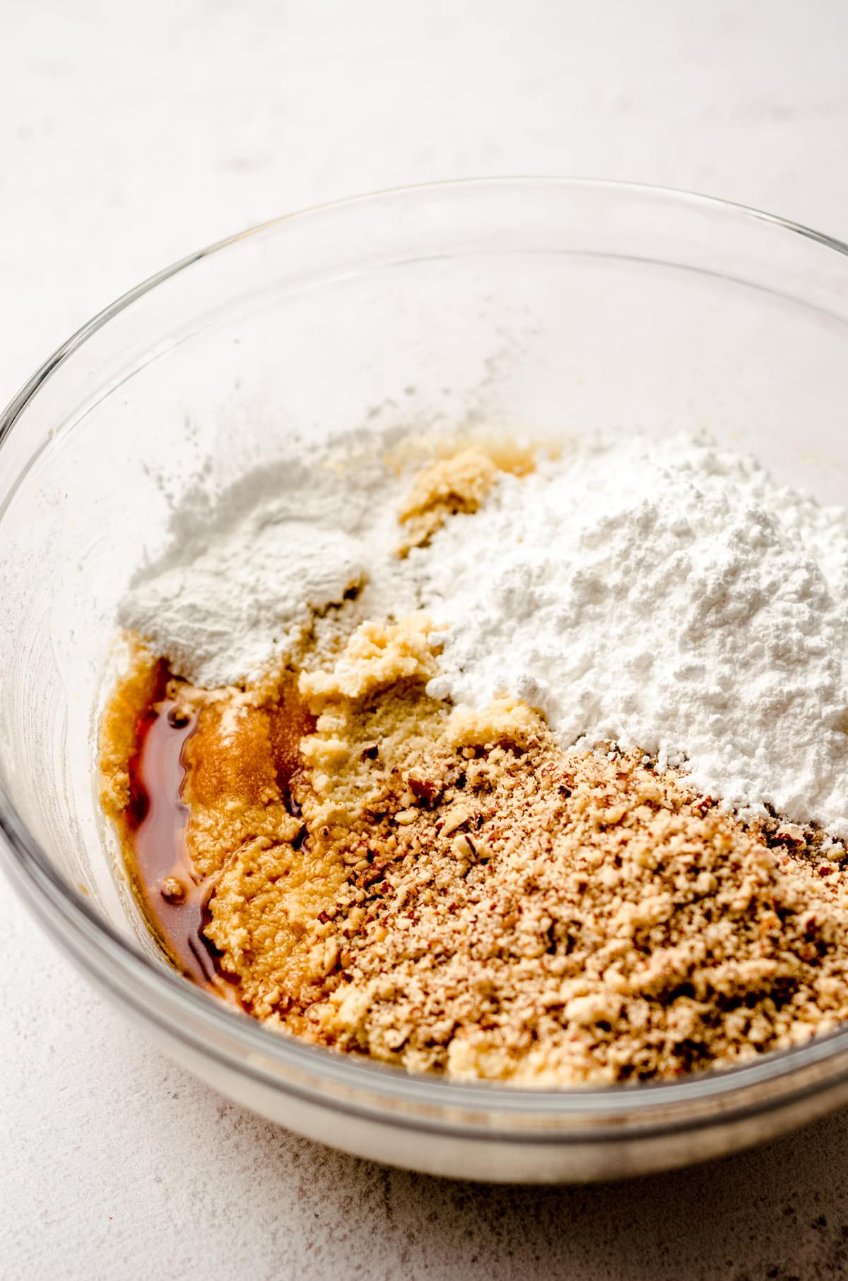 gluten free pecan sandies ingredients in a glass bowl