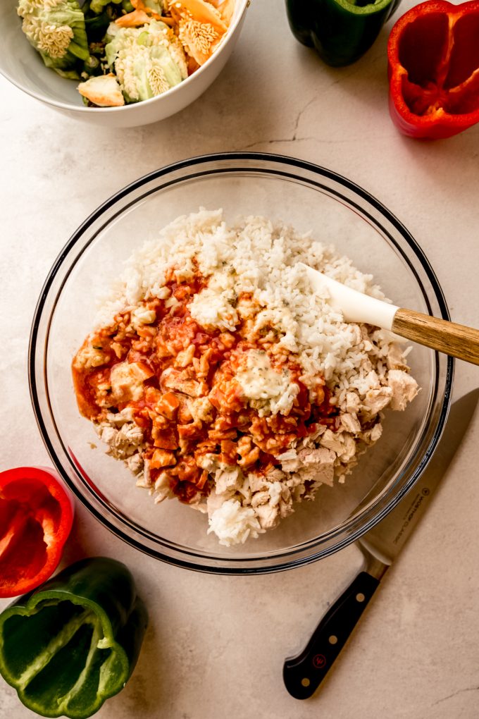 A bowl of the filling for buffalo chicken stuffed peppers.