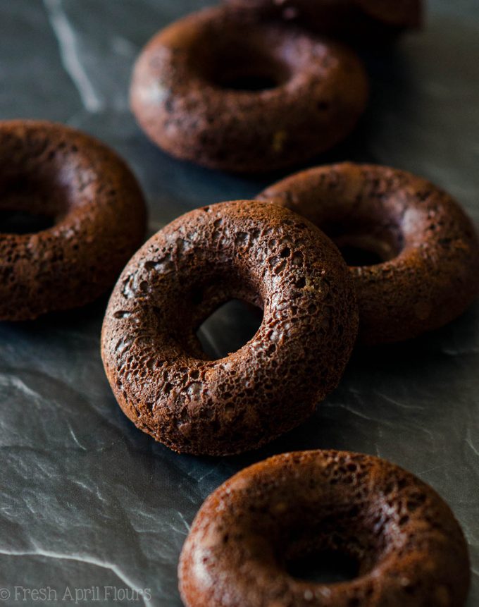 Baked Mint Chocolate Chip Donuts: Simple chocolate chip donuts topped with a simple mint glaze.