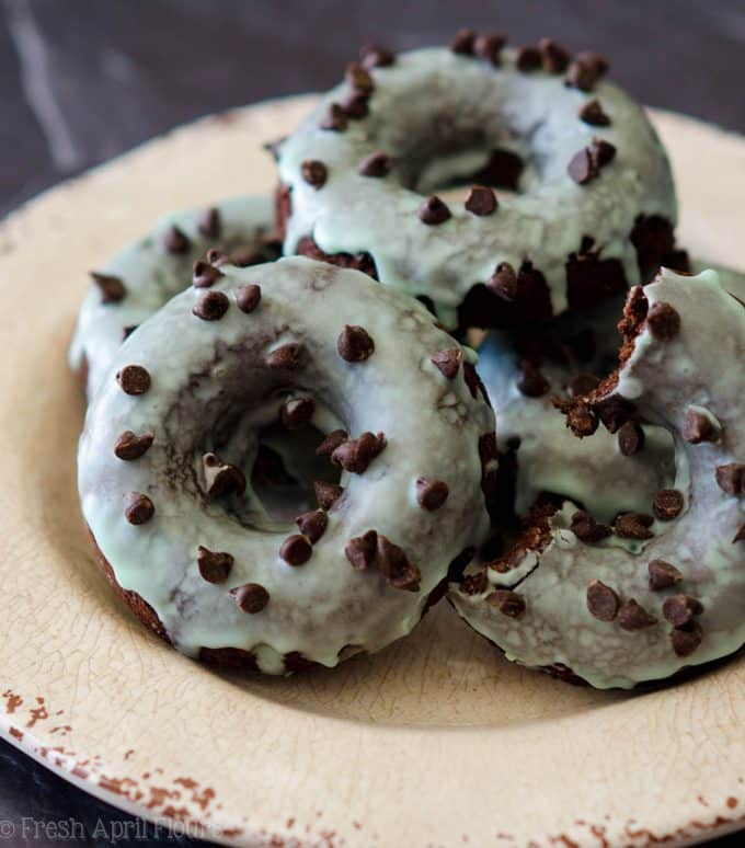 Baked Mint Chocolate Chip Donuts: Simple chocolate chip donuts topped with a simple mint glaze.