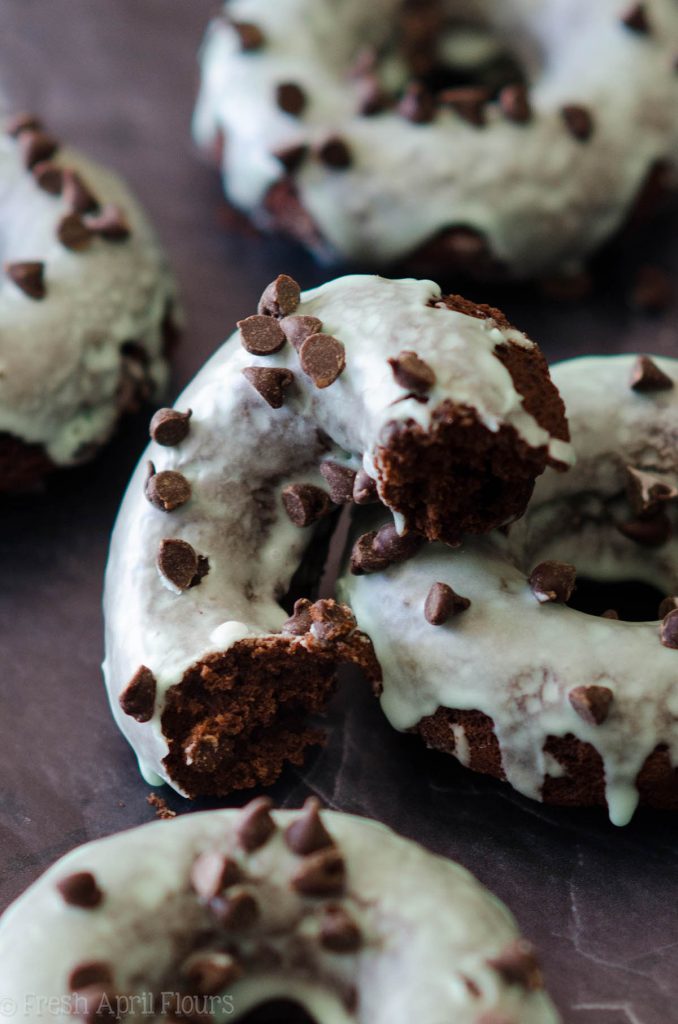 Baked Mint Chocolate Chip Donuts: Simple chocolate chip donuts topped with a simple mint glaze.