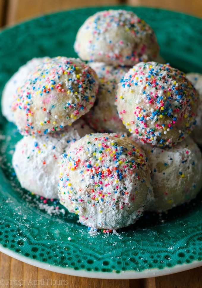 Funfetti Snowballs: Buttery, melt-in-your-mouth shortbread cookies filled with colorful sprinkles and rolled in powdered sugar.
