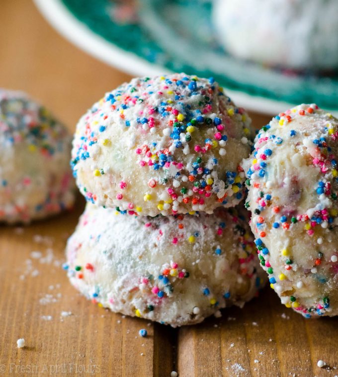 Funfetti Snowballs: Buttery, melt-in-your-mouth shortbread cookies filled with colorful sprinkles and rolled in powdered sugar.