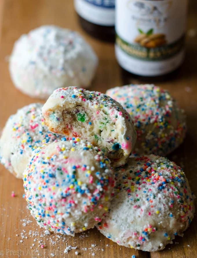 Funfetti Snowballs: Buttery, melt-in-your-mouth shortbread cookies filled with colorful sprinkles and rolled in powdered sugar.