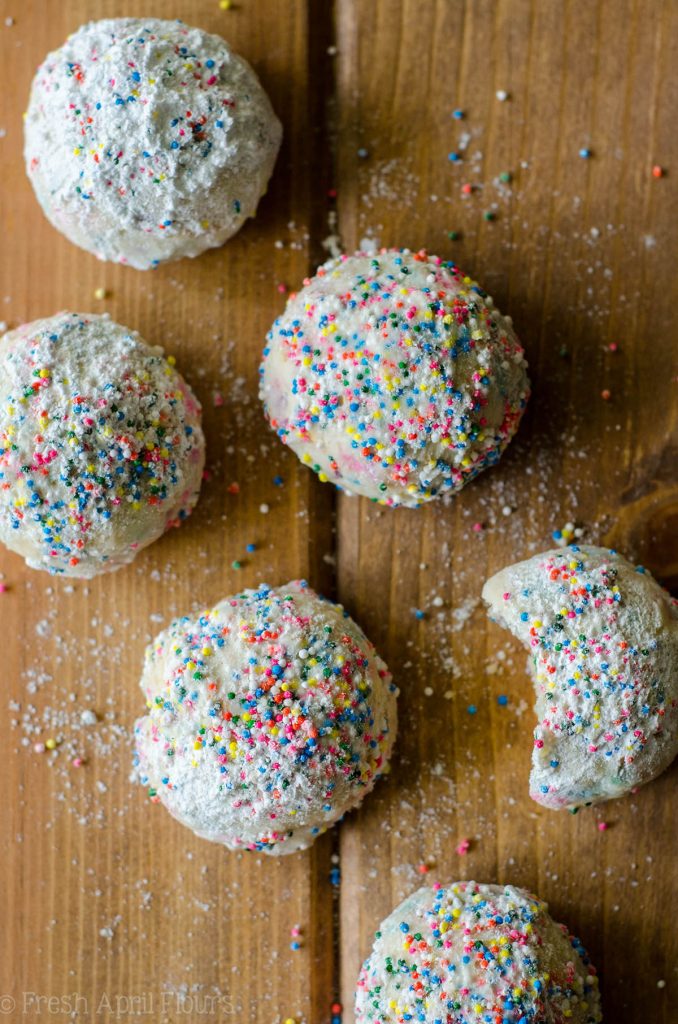 Funfetti Snowballs: Buttery, melt-in-your-mouth shortbread cookies filled with colorful sprinkles and rolled in powdered sugar.