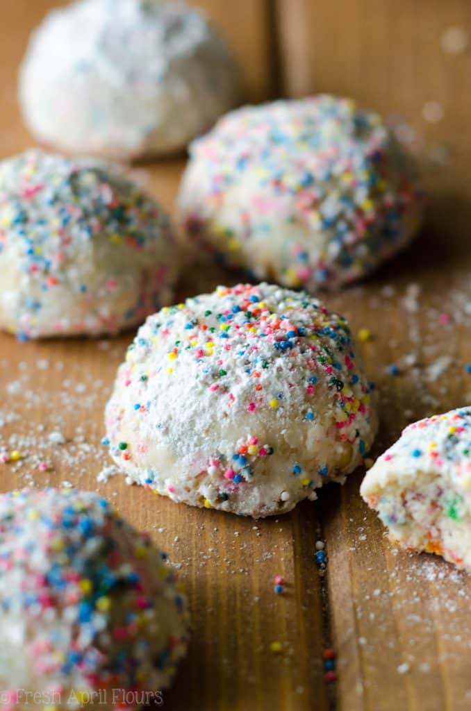 Funfetti Snowballs: Buttery, melt-in-your-mouth shortbread cookies filled with colorful sprinkles and rolled in powdered sugar.