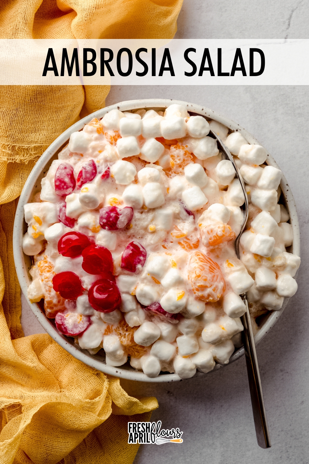 An easy dessert salad filled with mandarin oranges, crushed pineapple, and sweet maraschino cherries, in a creamy marshmallow sauce. via @frshaprilflours