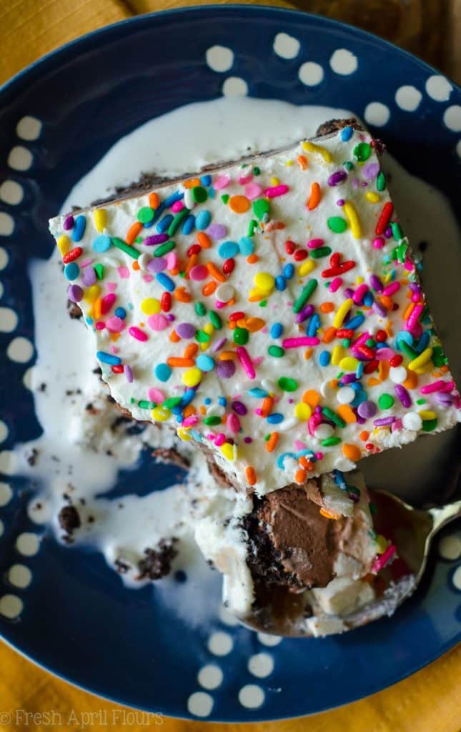 Ice Cream Sheet Cake: An easy recipe for homemade ice cream cake, filled with a crunchy cookie layer. Mix and match your favorite ice cream flavors or be brave and use your own homemade ice cream!