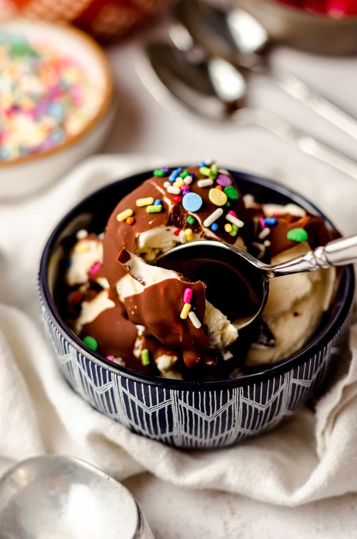a bowl of ice cream with homemade magic shell and ice cream on it