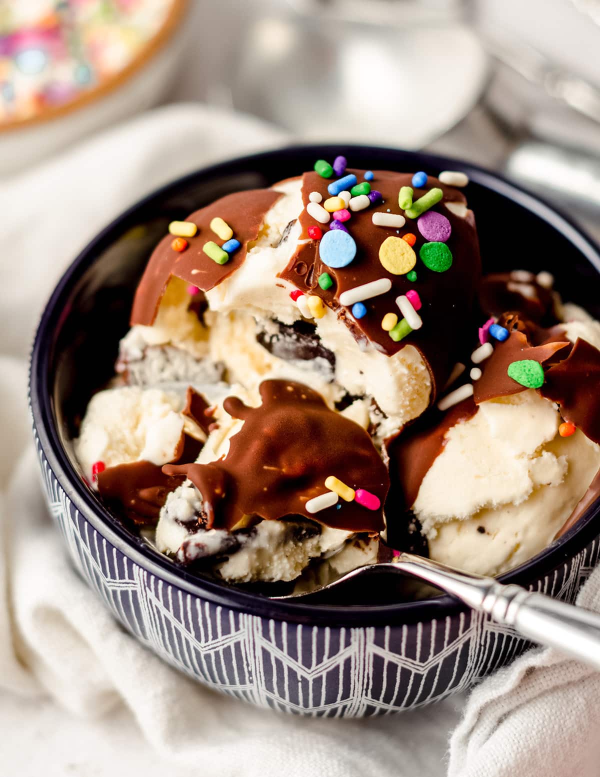 a bowl of ice cream with homemade magic shell and ice cream on it