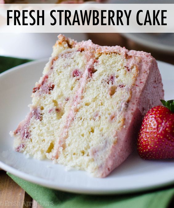 Soft and fluffy homemade strawberry cake made with fresh strawberries and topped with a creamy strawberry buttercream. via @frshaprilflours