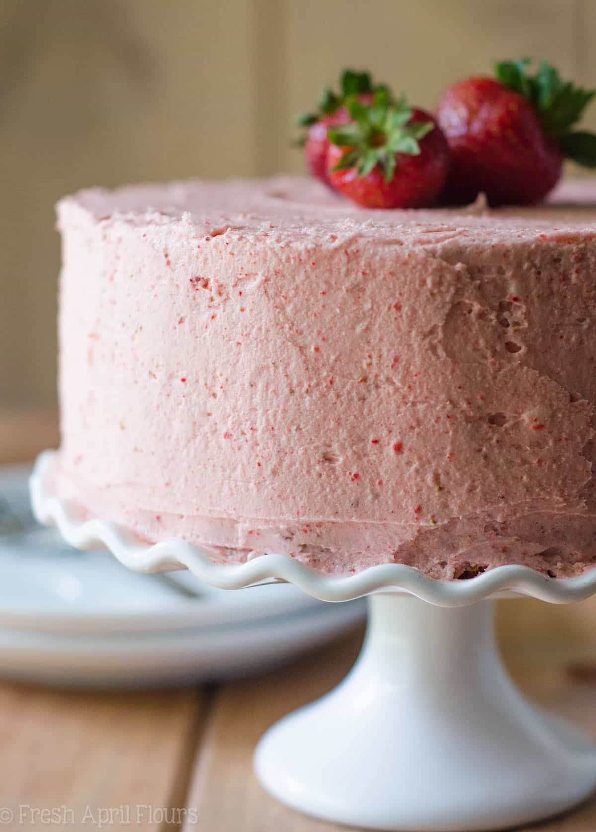 fresh strawberry cake on a cake stand