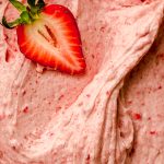 Close up photo of strawberry frosting.