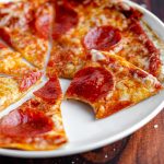 5 Minute Personal Tortilla Pizza: An easy way to whip up a personal size pizza without rolling any dough! Perfect for a "pizza bar" for entertaining or customization for family meals.