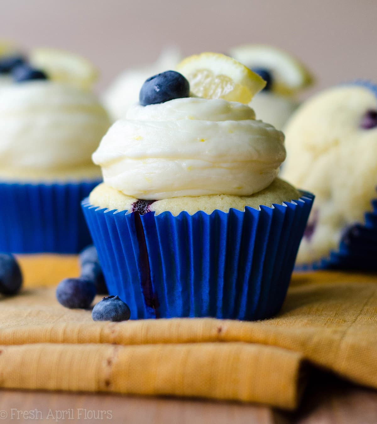 Blueberry Lemon Cupcakes with Lemon Buttercream: Tangy lemon cupcakes bursting with sweet and juicy blueberries, topped with a creamy lemon buttercream. via @frshaprilflours