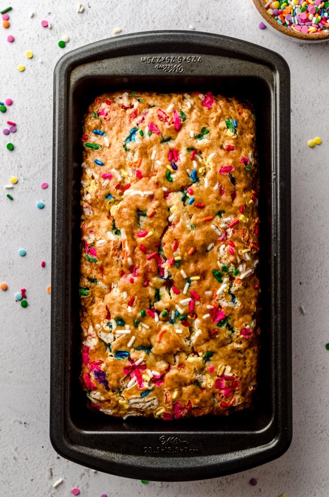 Aerial photo of funfetti bread in a loaf pan.