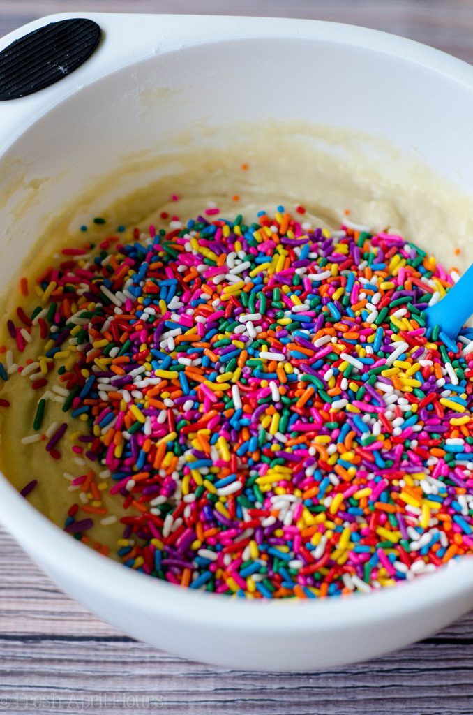 Funfetti Quick Bread: An easy vanilla almond quick bread filled with colorful sprinkles, perfect for any celebration. No mixer required!