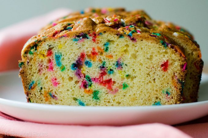 Funfetti Quick Bread: An easy vanilla almond quick bread filled with colorful sprinkles, perfect for any celebration. No mixer required!