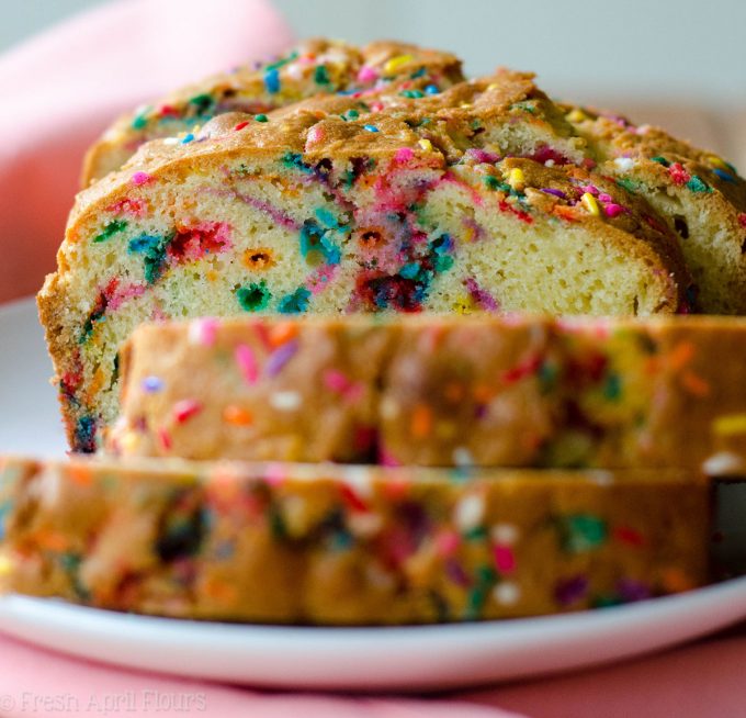 Funfetti Quick Bread: An easy vanilla almond quick bread filled with colorful sprinkles, perfect for any celebration. No mixer required!