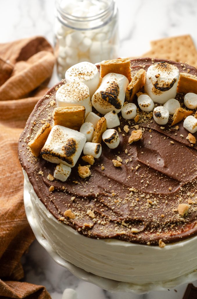 S'mores cake on a cake platter.
