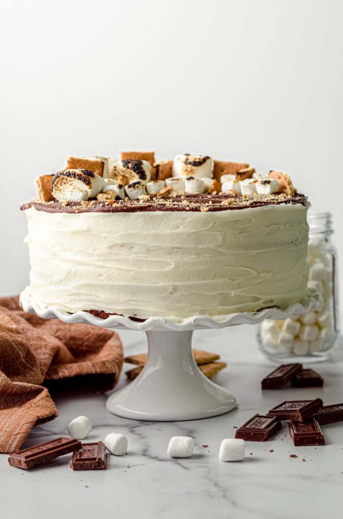 A s'mores cake on a cake platter.