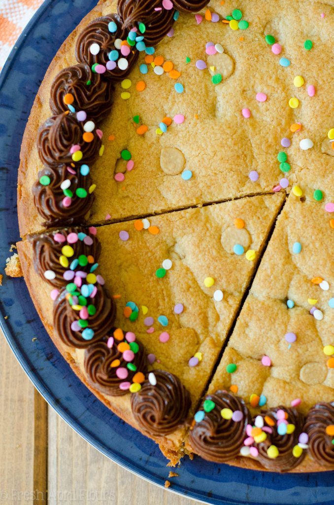 Peanut Butter Cookie Cake: A peanut buttery twist on the classic cookie cake. Top with chocolate, peanut butter, or vanilla frosting and get to decorating!