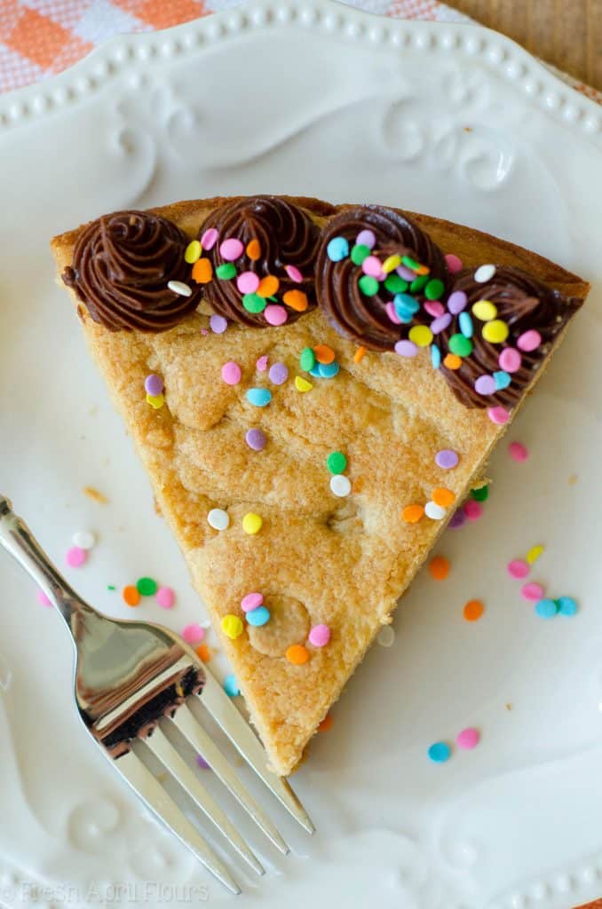 Peanut Butter Cookie Cake: A peanut buttery twist on the classic cookie cake. Top with chocolate, peanut butter, or vanilla frosting and get to decorating!