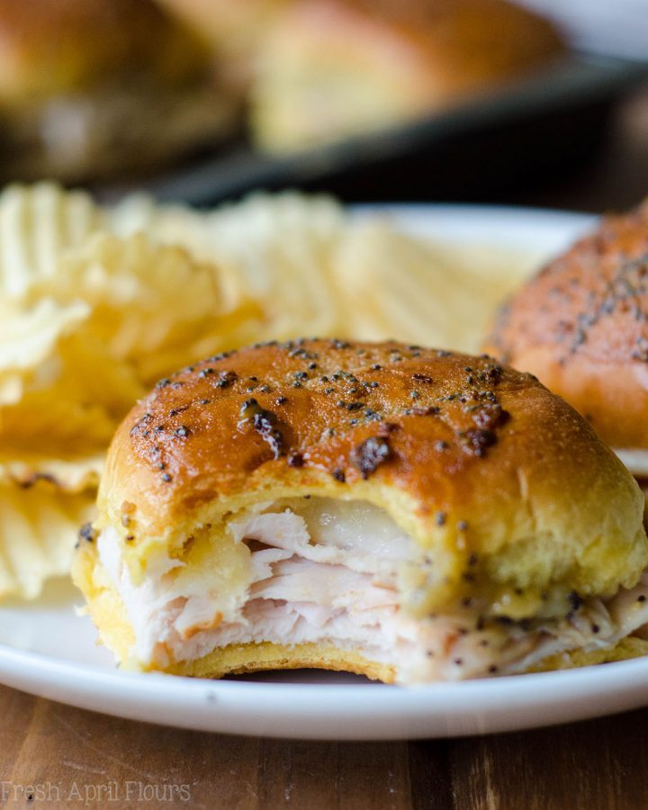 Easy turkey and cheese sliders baked in a honey mustard glaze.