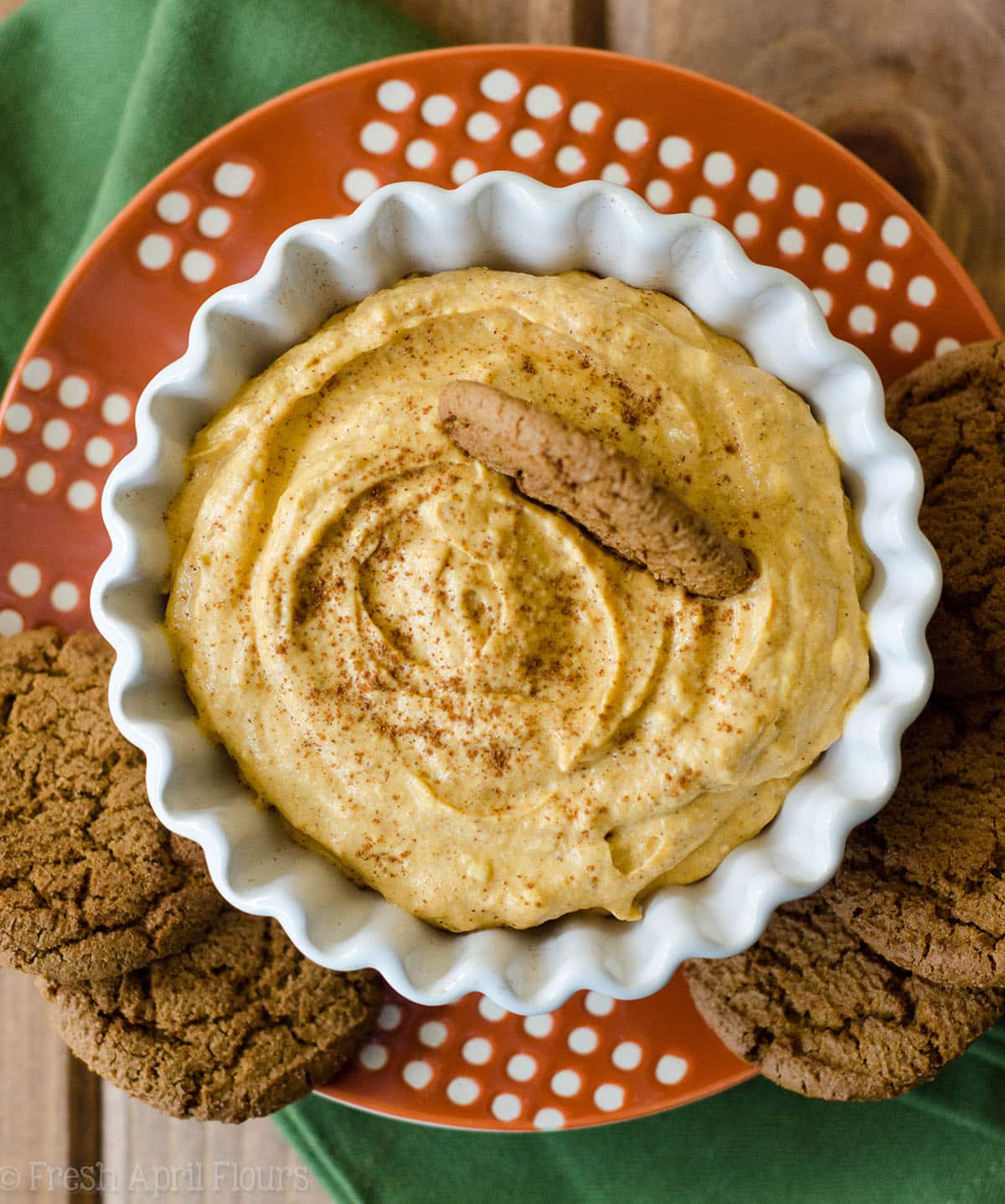 pumpkin dip with a gingersnap in it