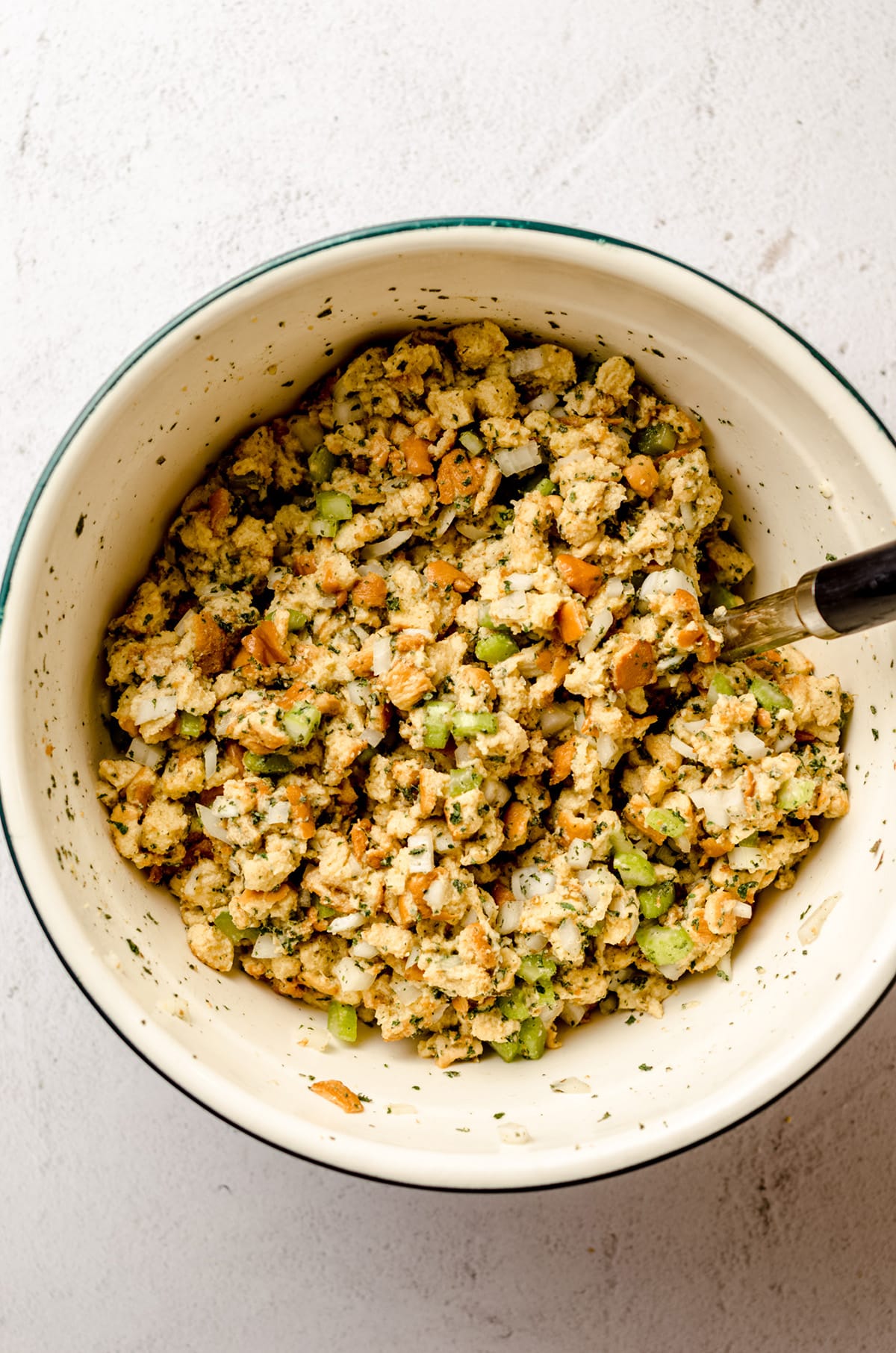 bread stuffing in a large bowl ready to be put into a baking dish