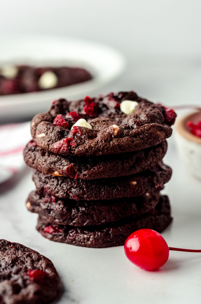 A stack of Black Forest cookies on a surface.