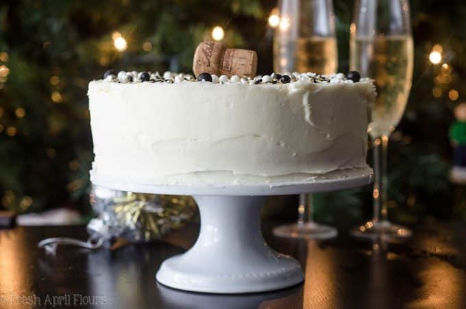 Champagne Layer Cake: Fluffy and moist white cake packed with a punch of real champagne and topped with a spiked buttercream.