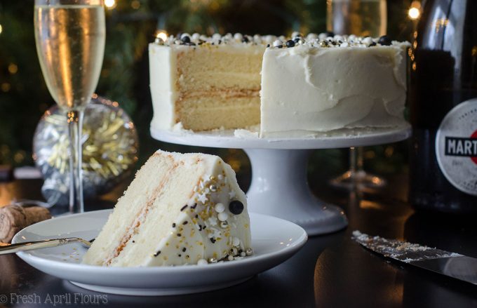 Champagne Layer Cake: Fluffy and moist white cake packed with a punch of real champagne and topped with a spiked buttercream.