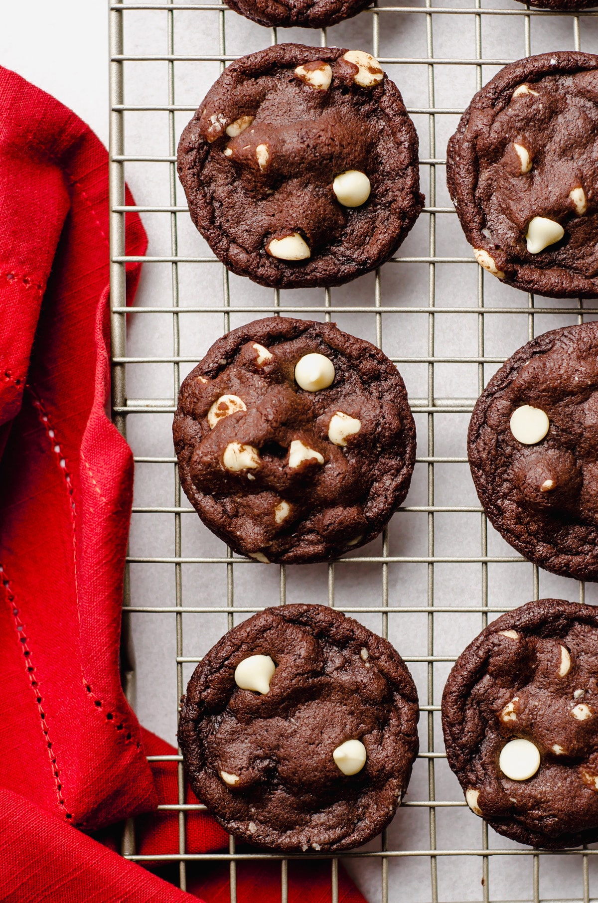 aerial photo of chocolate white chocolate chips on a wire cooling rack