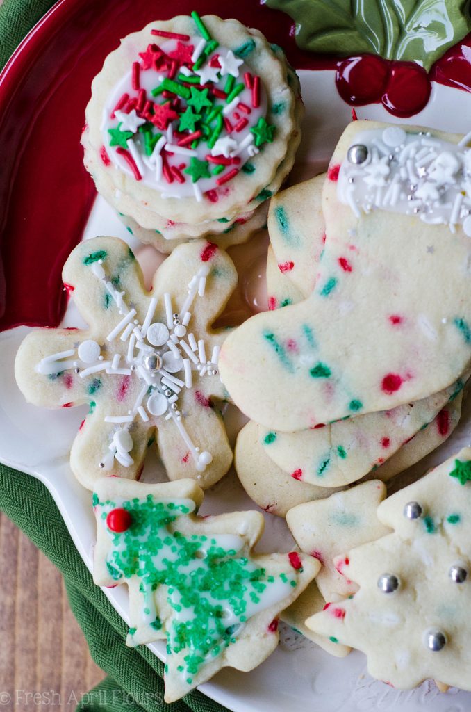 Funfetti Cut-Out Sugar Cookies: No dough chilling necessary for these soft cut-out sugar cookies that are filled with colorful sprinkles and perfect for any occasion. Crisp edges, soft centers, and completely customizable in flavor and shape!