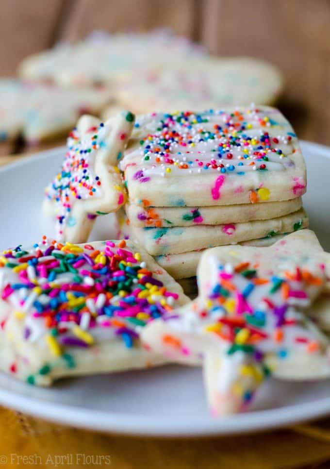 Funfetti Cut-Out Sugar Cookies: No dough chilling necessary for these soft cut-out sugar cookies that are filled with colorful sprinkles and perfect for any occasion. Crisp edges, soft centers, and completely customizable in flavor and shape!