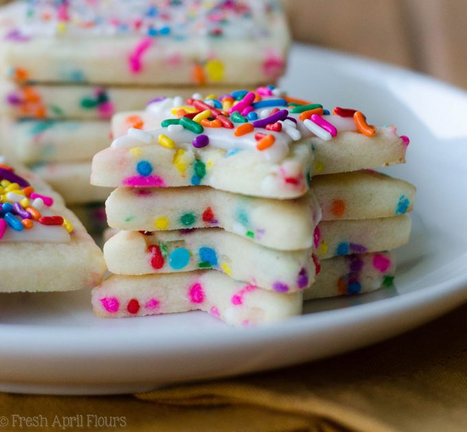 Funfetti Cut-Out Sugar Cookies: No dough chilling necessary for these soft cut-out sugar cookies that are filled with colorful sprinkles and perfect for any occasion. Crisp edges, soft centers, and completely customizable in flavor and shape!