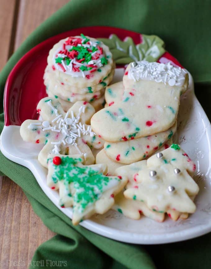 Funfetti Cut-Out Sugar Cookies: No dough chilling necessary for these soft cut-out sugar cookies that are filled with colorful sprinkles and perfect for any occasion. Crisp edges, soft centers, and completely customizable in flavor and shape!