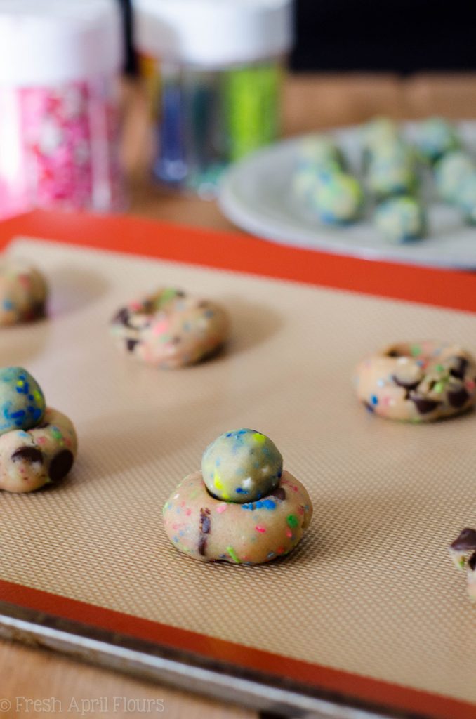 Gender Reveal Cookies: Classic chocolate chip cookies baked with a surprise of colored sprinkles inside perfect for revealing the gender of a baby.