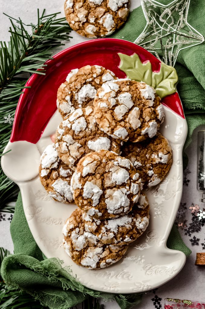 Aerial photo of gingerbread crinkle cookies on a Santa shaped plate.