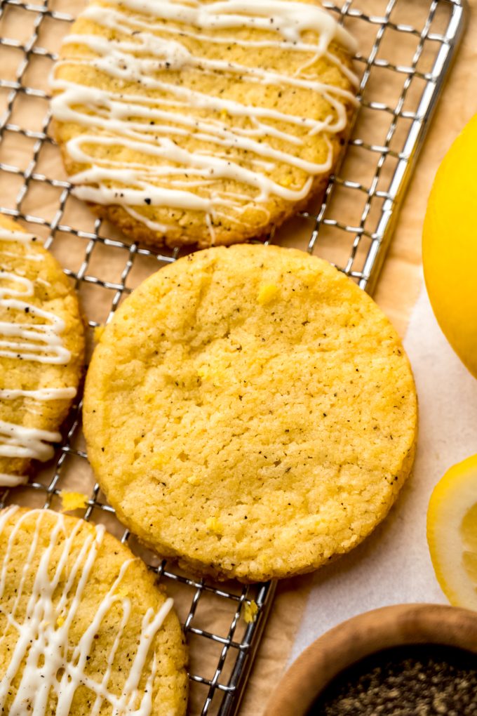 Lemon pepper slice and bake cookies on a cooling rack.